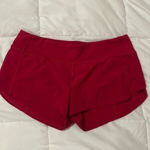 Red Lululemon shorts